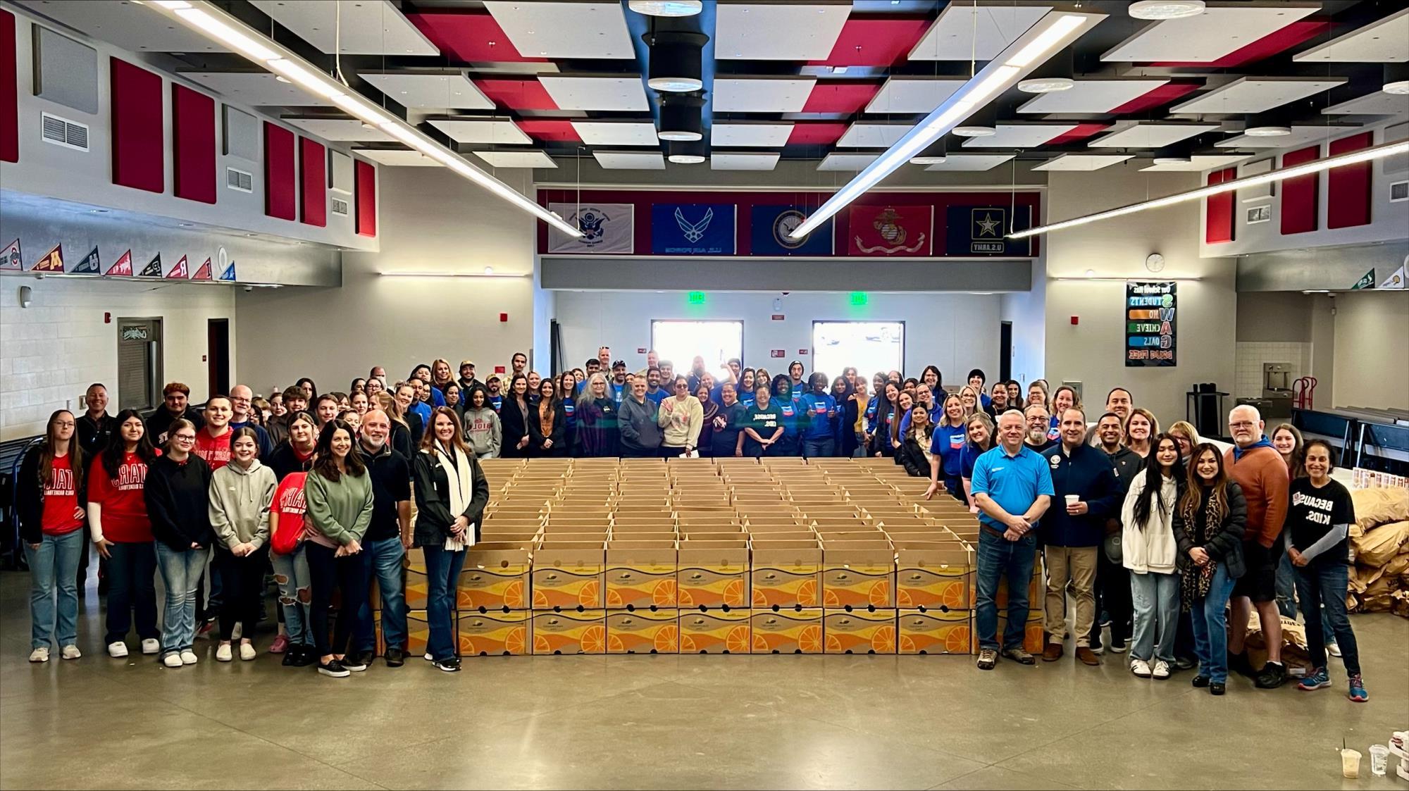 Serving at the Thanksgiving Basket Project at Standard Middle School, along with partners at Chevron and Bakersfield North Rotary.